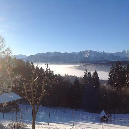 Holzhaus Zum Schwarz'n Aurach am Hongar